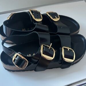 Birkenstock Women's Black Sandals with Gold Buckles size 10
